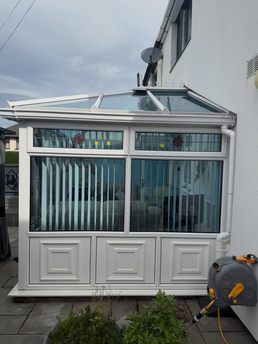 Before: White UPVC conservatory windows before spraying