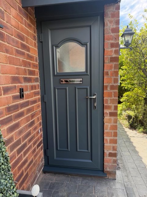 After: The same front door sprayed anthracite grey