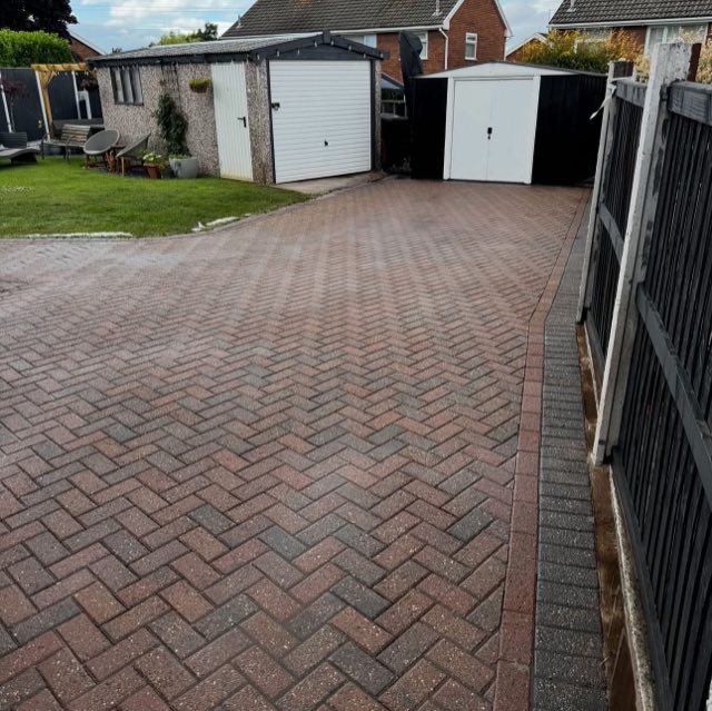 After: The same driveway after pressure washing